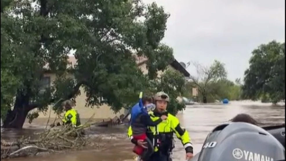 WATCH: Child wearing snorkel and mask rescued from flood waters